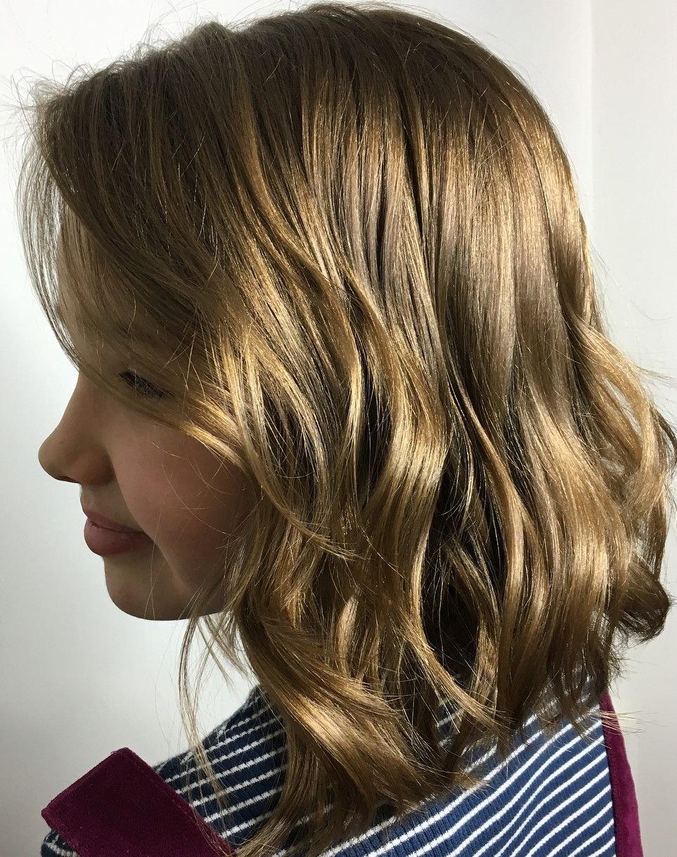 Стрижка для девочки на волнистые волосы