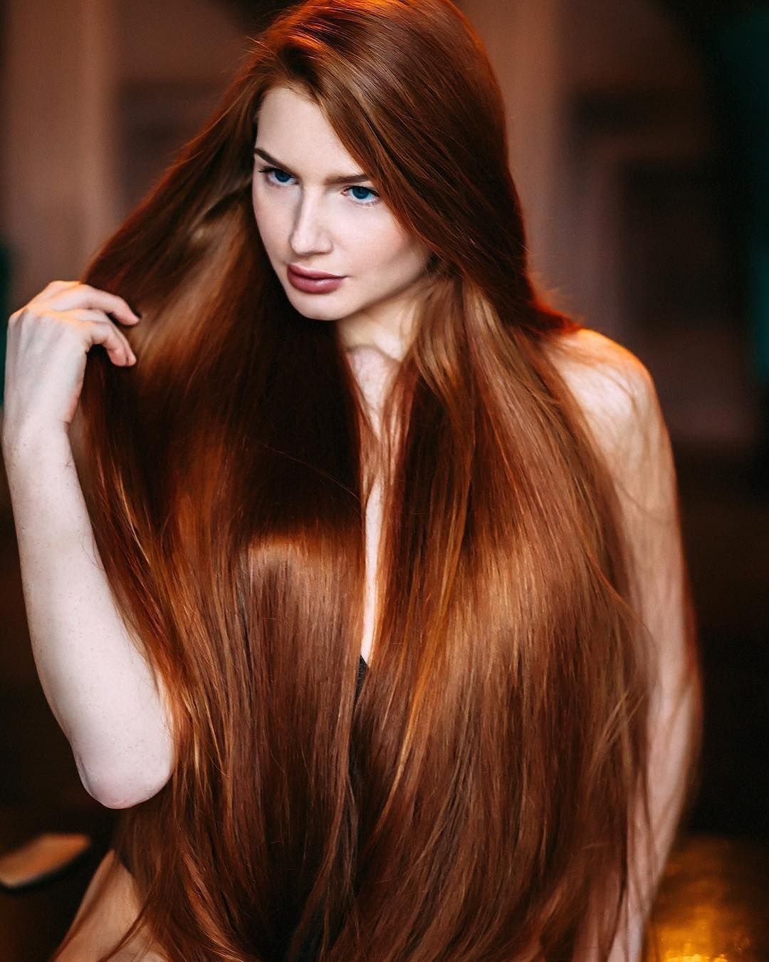 Красивые длинные рыжие волосы