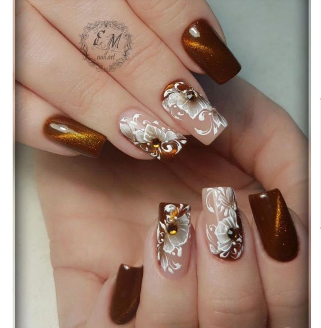 Ногти острые коричневые