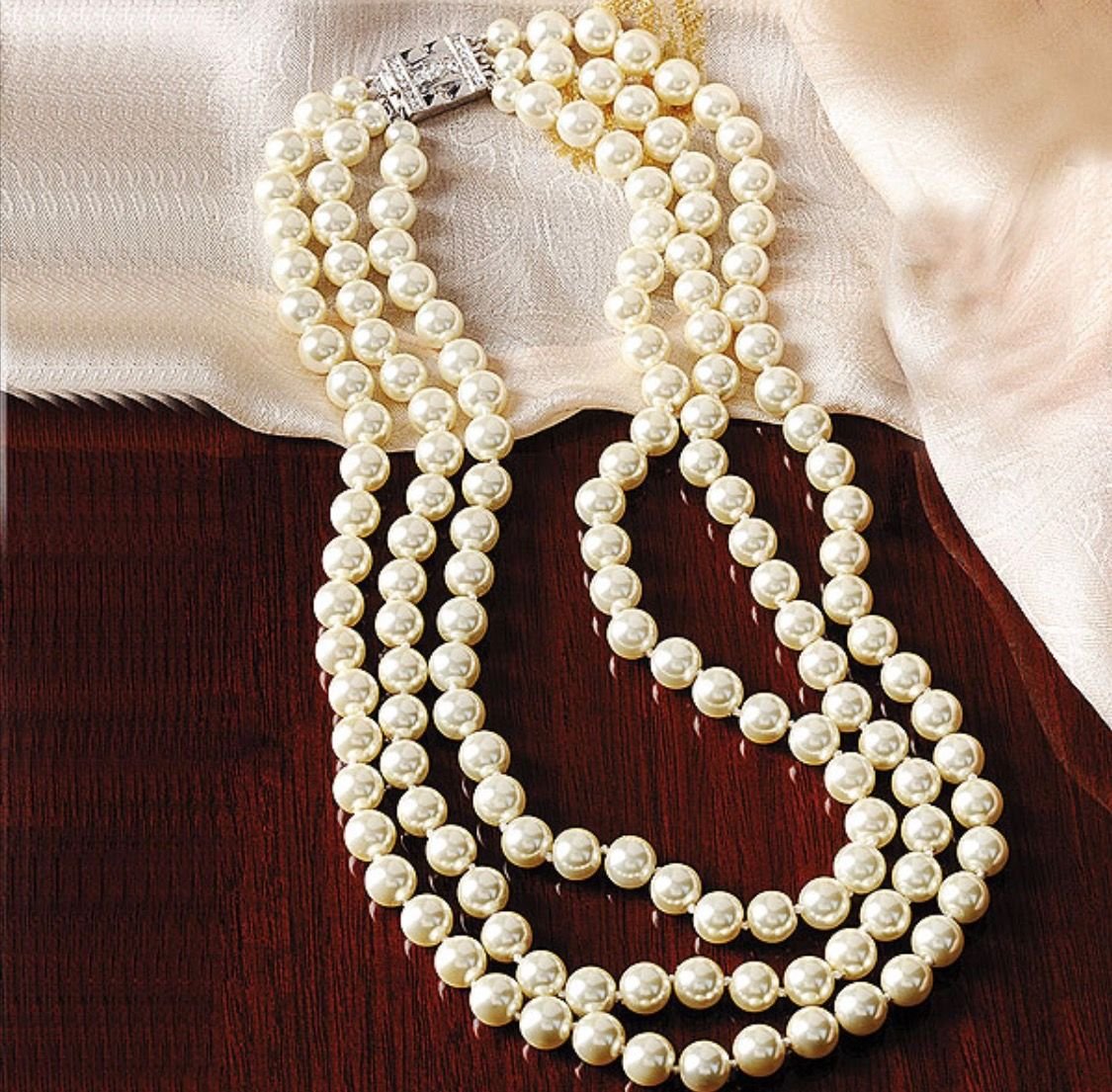 Жаклин Кеннеди жемчужные бусы