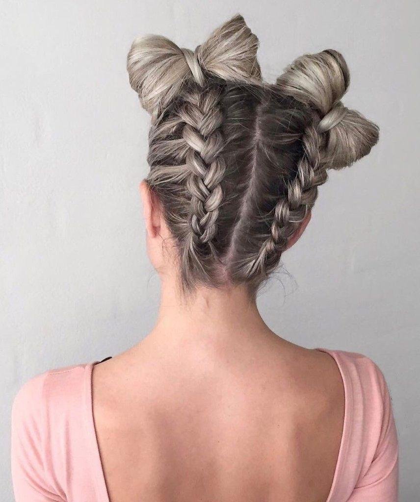 Прическа с двумя пучками с плетением