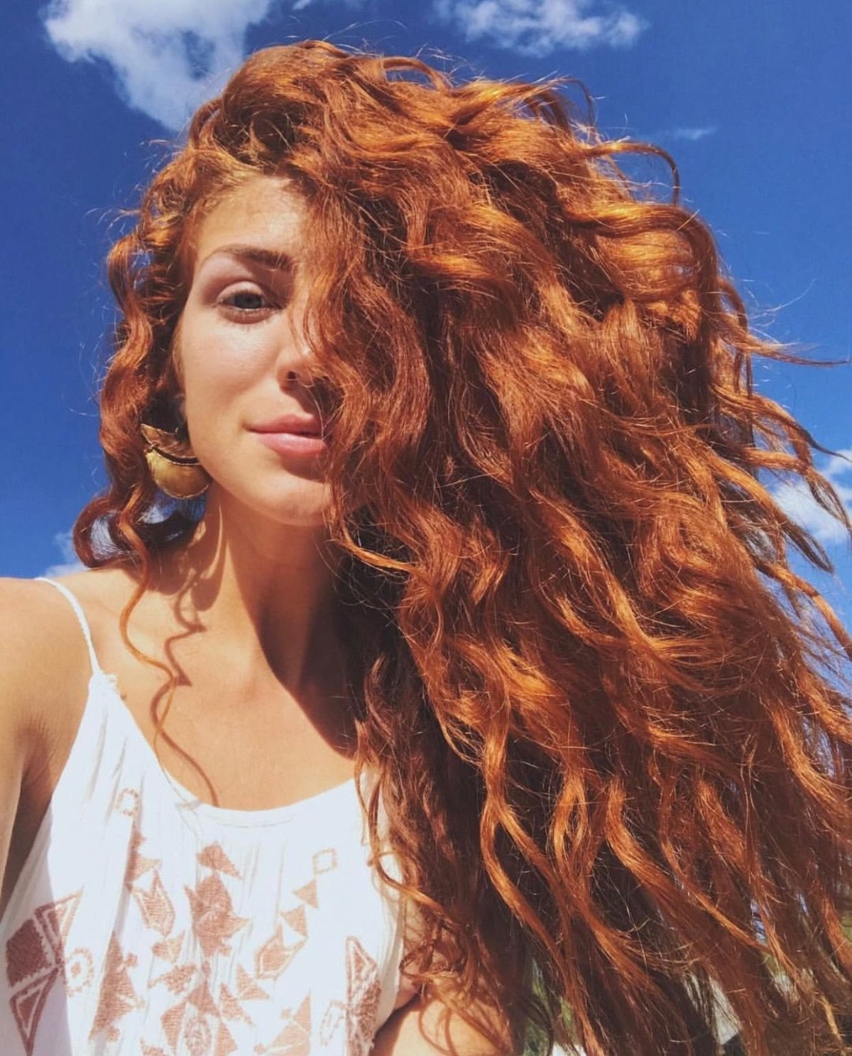 Рыжая кудрявая