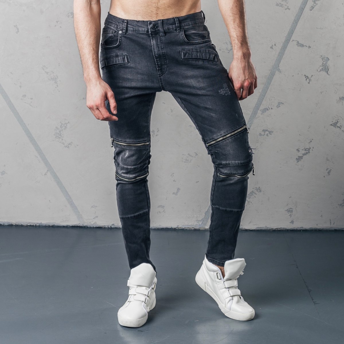 Джинсы с молниями на коленях