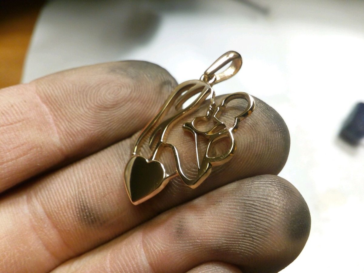 Кулончик мать и дитя