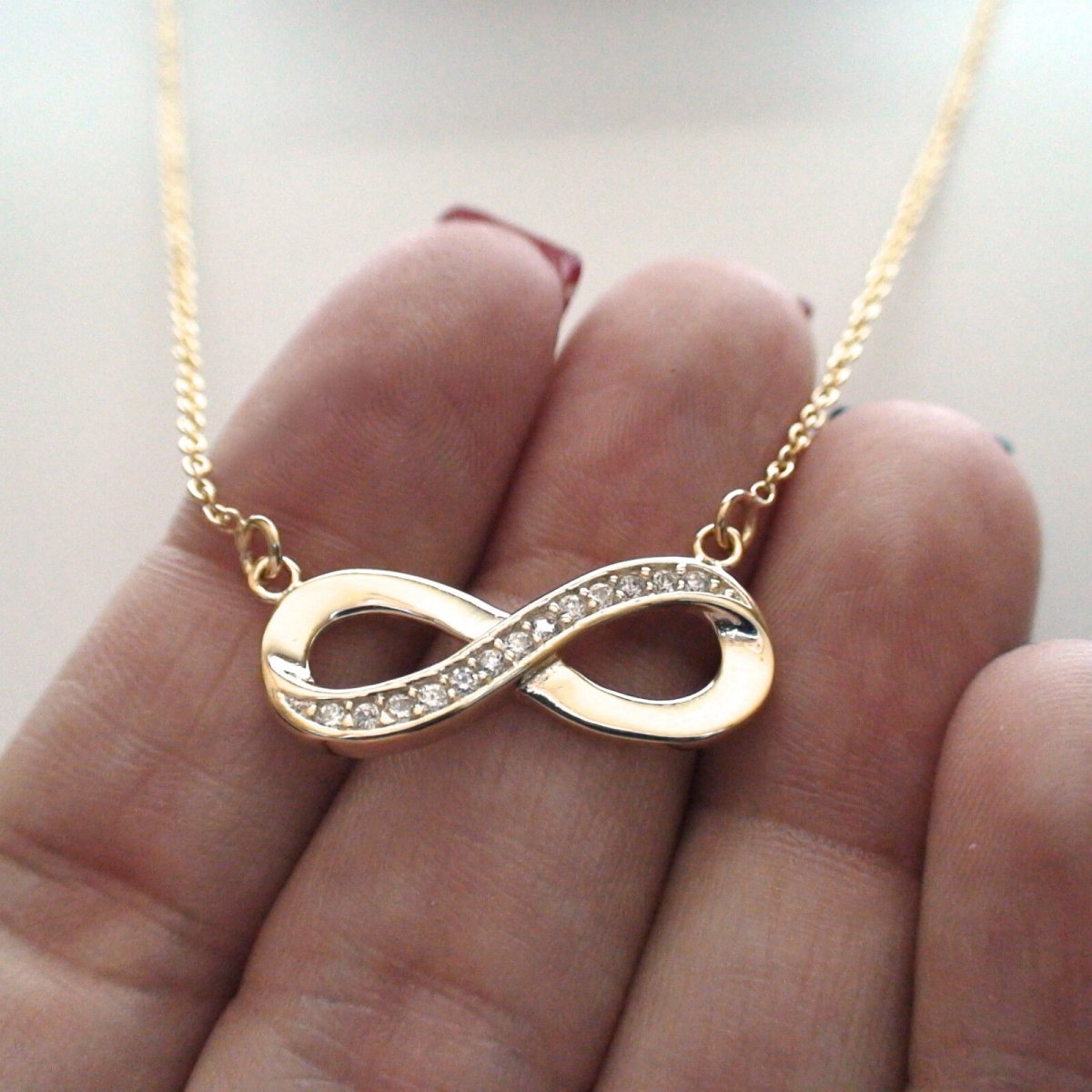 Подвеска бесконечность золото