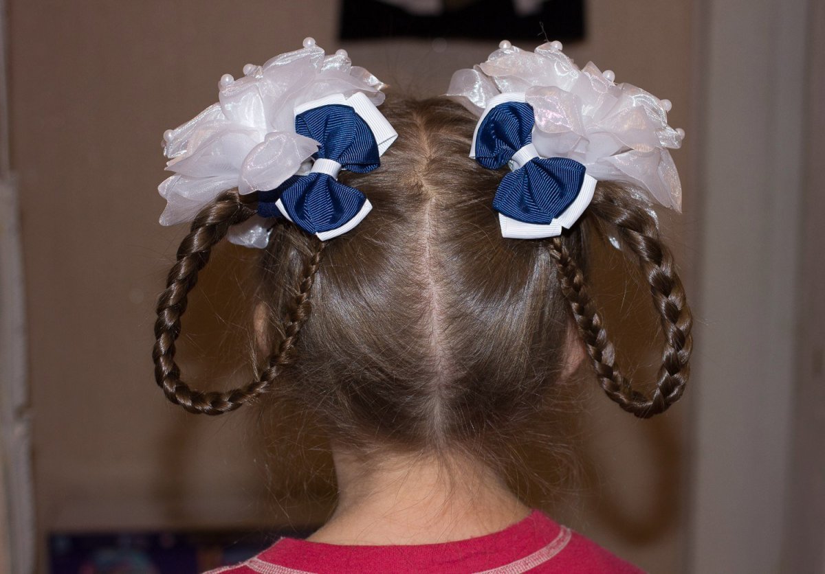 Косички с бантами