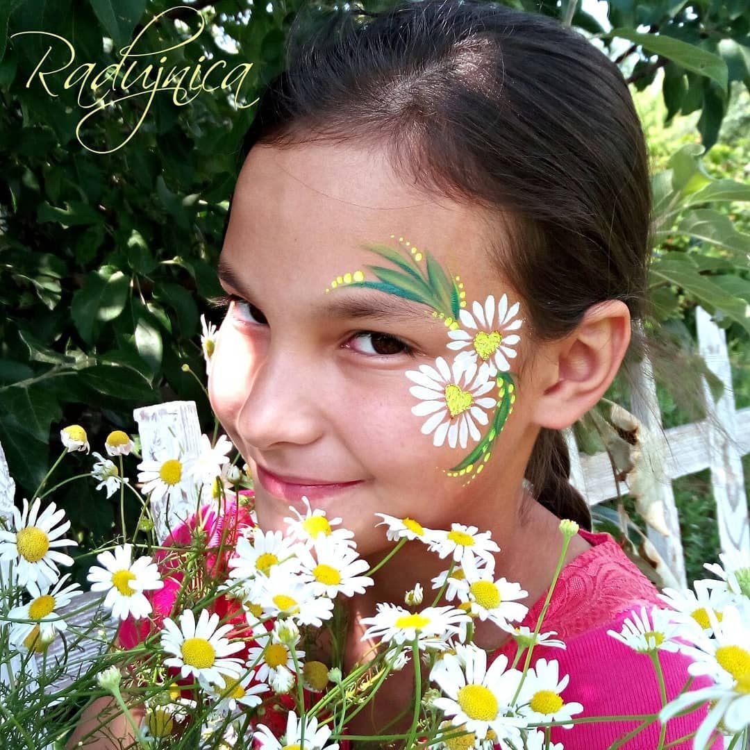 Аквагрим ромашки на лице