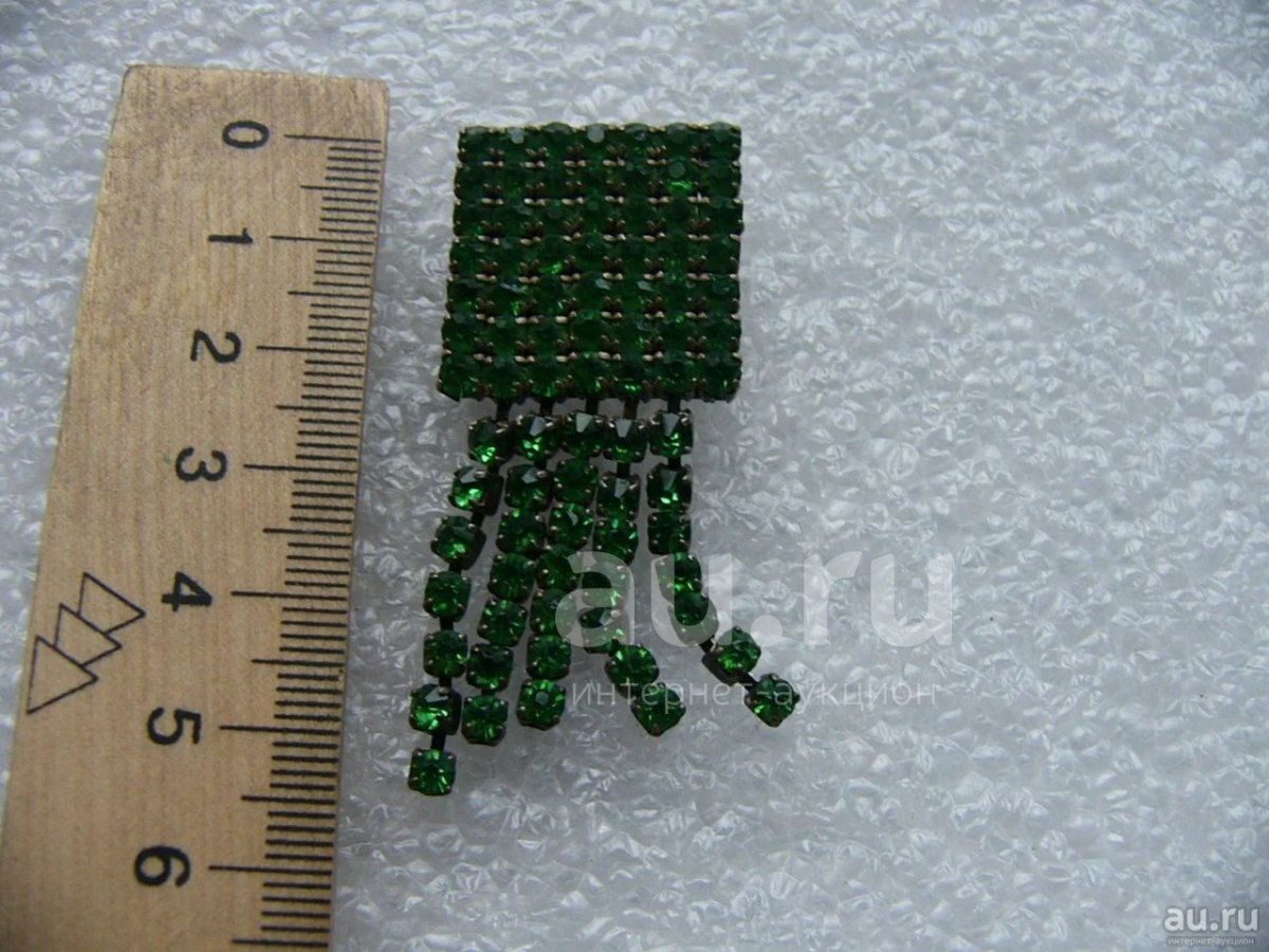 Брошь с камнями ракета люм