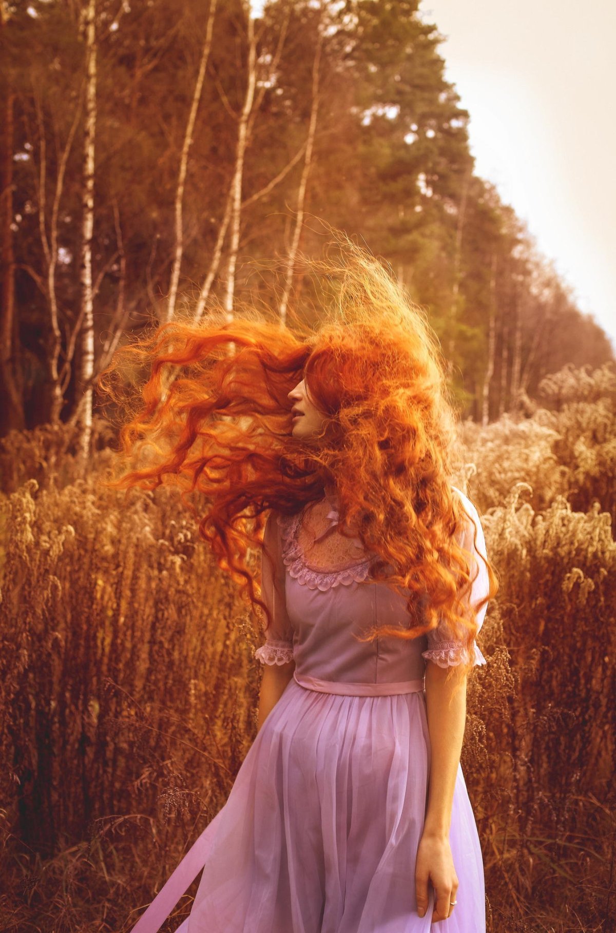 Красивые длинные рыжие волосы