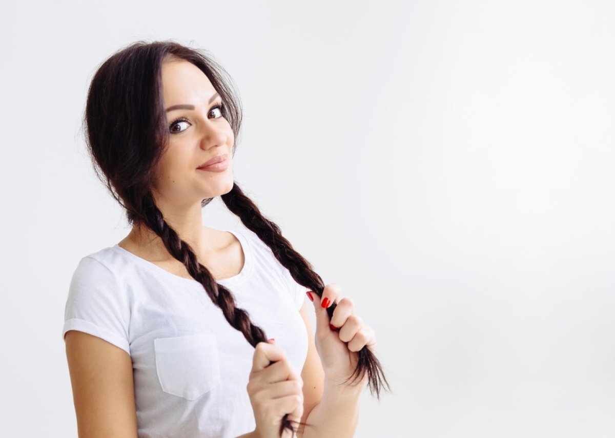 Девушка с косами стоковые фото